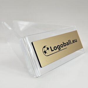 przeźroczysta tabliczka ze złotą tabliczką z napisem logoball.eu